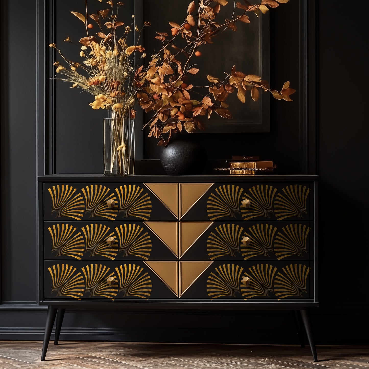 Transferencia Geo Wave Re-Design with Prima en cómoda negra estilo mid-century con patas de palillo - abanicos geométricos dorados en cajones, ambiente dramático oscuro
