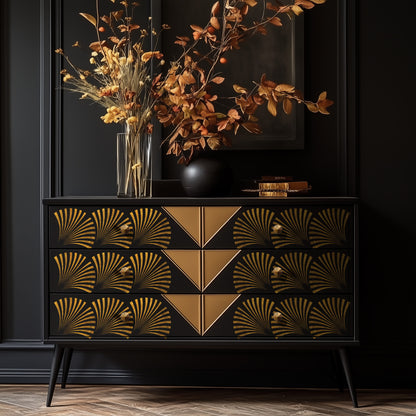Transferencia Geo Wave Re-Design with Prima en cómoda negra estilo mid-century con patas de palillo - abanicos geométricos dorados en cajones, ambiente dramático oscuro
