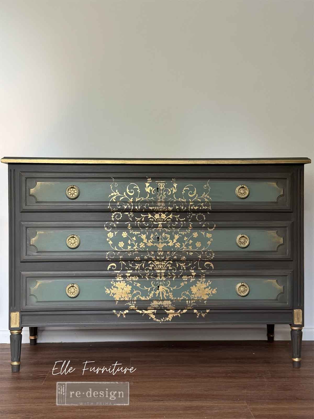 Transferencia decorativa Manor Swirls Kacha en cómoda gris antracita con paneles teal restaurada - espirales dorados en tres cajones - Re-Design with Prima